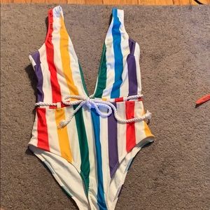 Deep V front and back bathing suit.